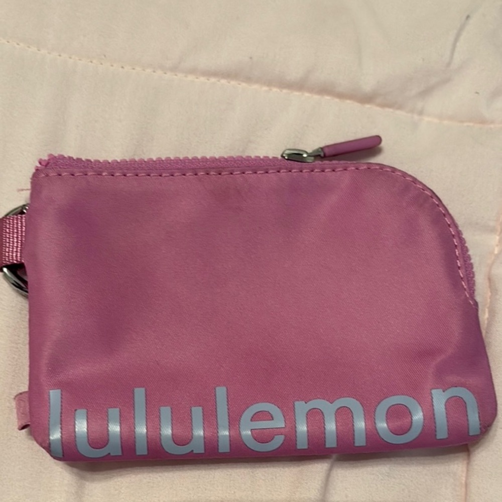 lululemon athletica light purple clipable card pouch.